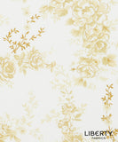 Liberty Fabrics floral patterned fabric featuring large cream and pale yellow flowers with gold outlines on a white background.