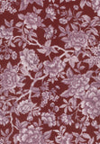 A close-up of a floral patterned fabric or wallpaper featuring large lavender and mauve flowers with leaves on a deep burgundy background.