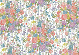 A repeating floral pattern featuring watercolor-style pink, purple, blue, yellow, and green flowers on a white background with thin vertical gray lines.