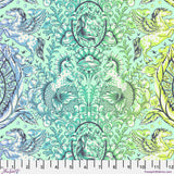 Fabric pattern with mermaids, dragons, and horses in teal and green on a light blue background.