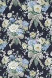 Portrait view of Liberty Tana Lawn fabric with white and light blue peonies, ribbon bows and green leaves on a dark navy background.